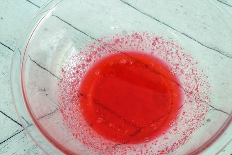 Dissolving Jell-o In Boiling Water.