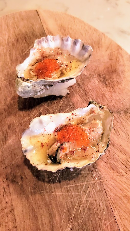  Normandie PDX Shucked Portland Broiled Oysters with Boquerone butter, Lardo, Pink peppercorn, Roe for $8