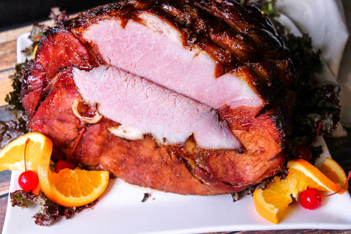 A slice cut from the Sangria Glazed Ham.