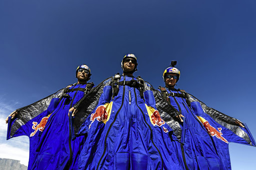 The Red Bull Airforce team in their wingsuits.