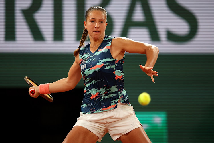 Diane Parry of France plays a forehand against Barbora Krejcikova of Czech Republic in their first round match on day 2 of the 2022 French Open at Roland Garros in Paris, France on May 23 2022.