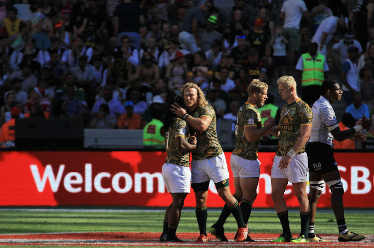 Werner Kok and Branco du Preez of South Africa during day 2 of the HSBC Cape Town Sevens semi final, match between South Africa and Fiji at Cape Town Stadium on December 09, 2018 in Cape Town, South Africa.