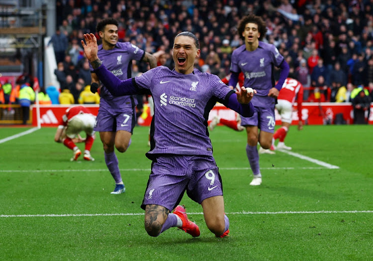 Darwin Nunez celebrates scoring Liverpool's first goal in their Premier League win against Nottingham Forest at The City Ground in Nottingham on Saturday.