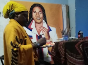 Rasta unveils his portrait of Shauwn Mkhize and her son Andile Mpisane.