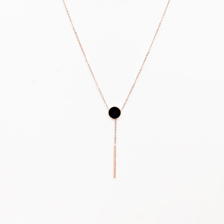 Black dot fringed long pendant necklace