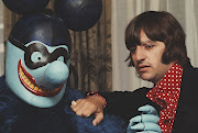 Beatle Ringo Starr has a close encounter with a Blue Meanie at a 1968 press screening for the film 'Yellow Submarine'.