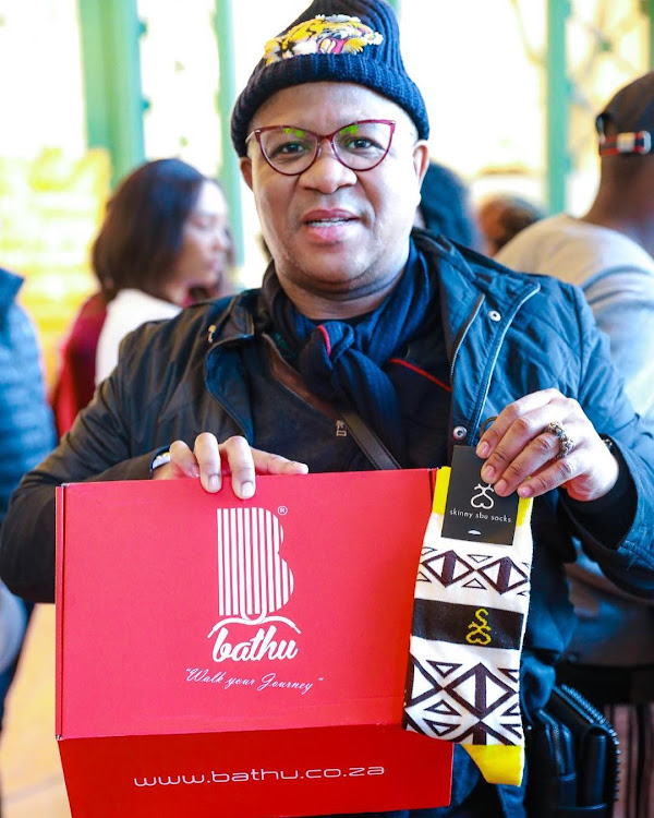 Fikile Mbalula supporting a local brand called Bathu.