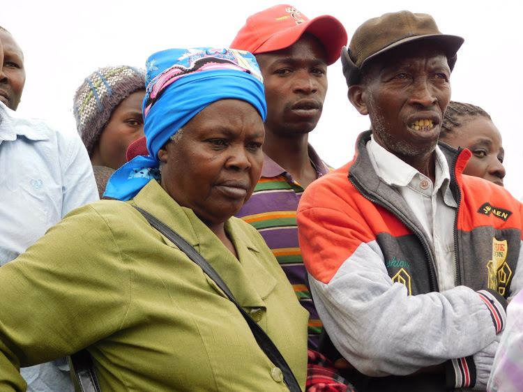 Neighbours at Ndung'u's home in Nyairoko village in Mawingu, Ol Kalou