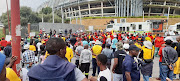 Football fans have gathered outside Orlando Stadium ahead of the SowetoDerby between Orlando Pirates and Kaizer Chiefs to push for the reopening of stadiums.