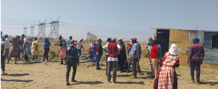 A group of people invaded an open piece of land in Olievenhoutbosch after the EFF allegedly claimed there was free land for all who needed it.