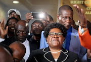 Zimbabwe's former vice president Joice Mujuru smiles while addressing supporters in Harare, March 1, 2016. Picture Credit: REUTERS/Philimon Bulawayo