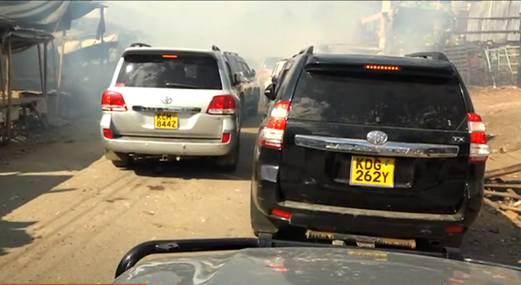 Vehicles on Raila Odinga's convoy engulfed in teargas at Pipeline area, Nairobi, March 30, 2023.