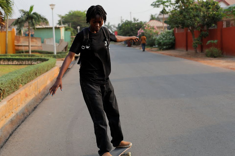 Harmonie Bataka, 27, a skateboarder and skateboarding tutor, practises skateboarding on streets in her neighbourhood in Tema, Ghana, February 13, 2022. Bataka quit her job last year to pursue the sport full time, to the dismay of friends and family. "They said there were too many boys doing it, boys who were too good for me to win any competitions... but I didn't care" she said. "I just wanted to be free to do what I love."