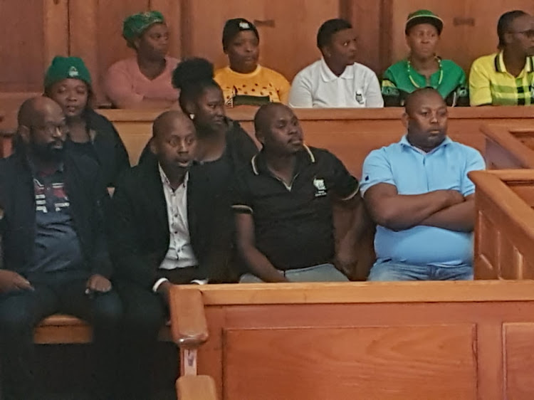 ANC Political heavyweight Andile Lungisa flanked by supporters attends grahamstown high court for his criminal appeal