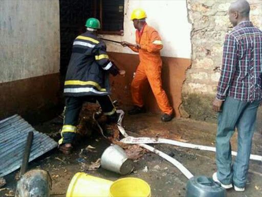 Firefighters at Msambweni secondary school where a dormitory went up in flames on Saturday, October 22. /ALLOYS MUSYOKA