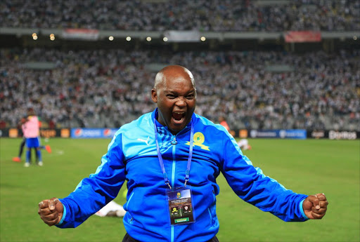 Pitso Mosimane celebrates at final whistle after Sundowns win the 2016 CAF Champions League Final beating Zamalek 3-1 on aggregate at the Borg El Arab Stadium in Alexandria, Egypt on 23 October 2016 Â©Gavin Barker/BackpagePix