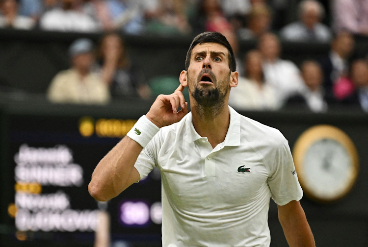 Serbia's Novak Djokovic reacts during his semi final match against Italy's Jannik Sinner.