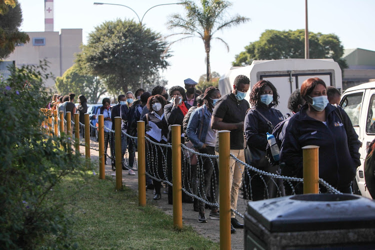 Johannesburg healthworkers queue for a Covid-19 vaccine outside the Charlotte Maxeke Hospital. Picture: SUNDAY TIMES/ALAISTER RUSSEL