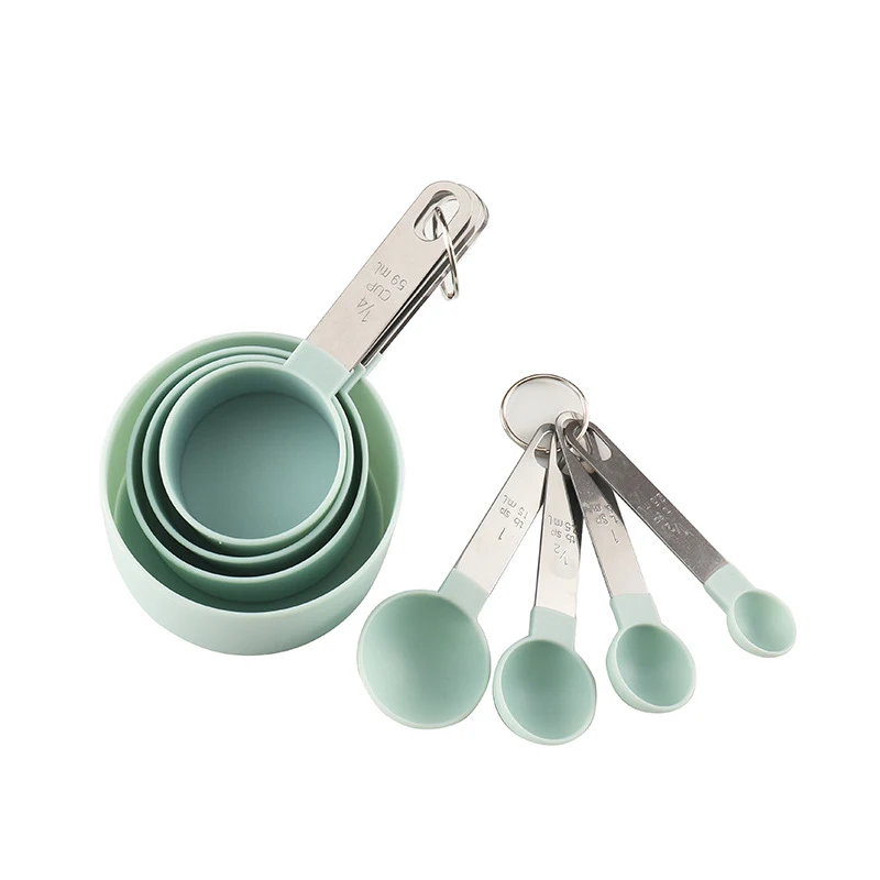 Stainless steel measuring cup and spoon set for accurate cooking and baking. Durable, easy to clean, and essential for a