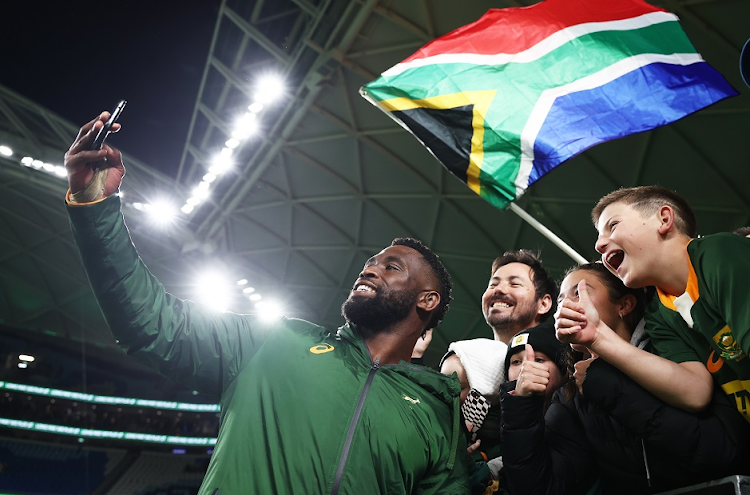 Siya Kolisi of the Springboks celebrates victory with fans after SA's Rugby Championship win against Australia at Allianz Stadium in Sydney on September 3 2022.