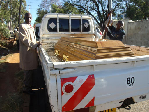 The coffin with the body of ex-IG David Kimaiyo's relative after the bus it was being transported was ambushed by Pokot bandits at Chesongoch, on Friday, February 17, 2017. /MATHEWS NDANYI