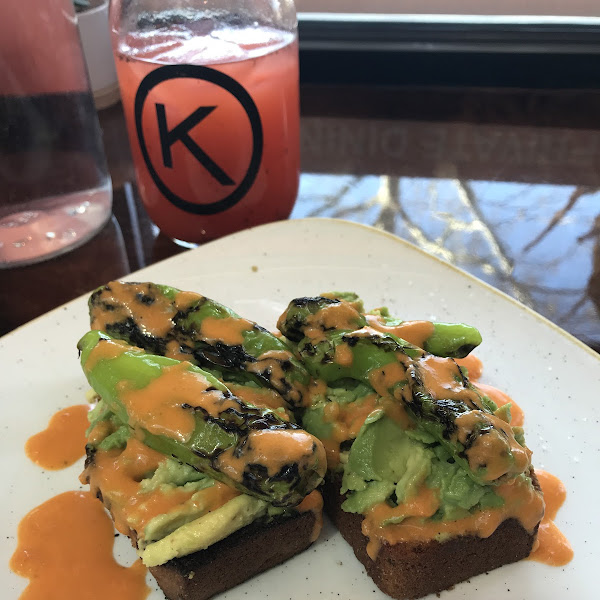 Avocado toast with roasted shinto peppers and hot sauce. Strawberry thyme lemonade.