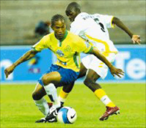 DUMMY: Mamelodi Sundowns' Josta Dladla sends Black Leopards Eric Ramavhale the wrong way in their Telkom Knockout Cup match on Saturday. Pic. Adrian de Kock. 18/11/06. © Backpagepix.