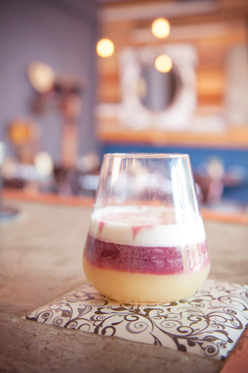 Douglas + Hale's New York Sour - Bourbon, lemon, syrup, egg white and red wine.