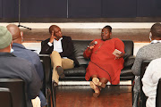 Rivonia Circle chair Songezo Zibi in conversation with facilitator Nontando Ngamlana during a town hall event in East London on Wednesday night.