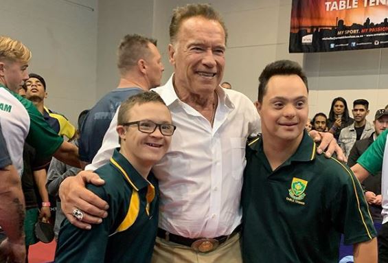 Arnold Schwarznegger poses with fans during the Arnold Classic Africa festival in Sandton.