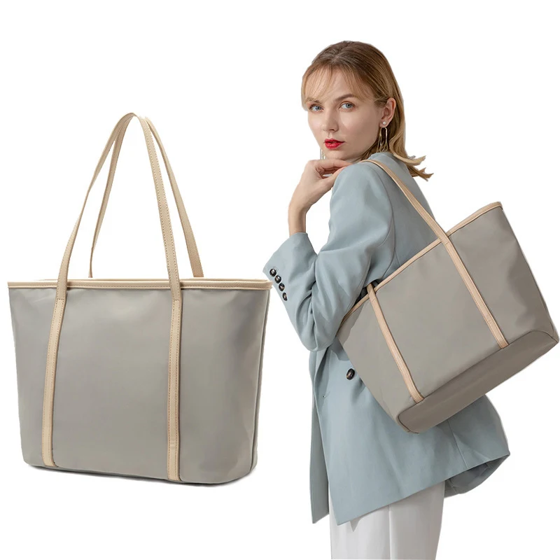 Große Nylon Oxford Canvas Tasche mit viel Stauraum. Ideal für Reisen, Arbeit oder Alltag. Robuste und langlebige Aufbewahrung.