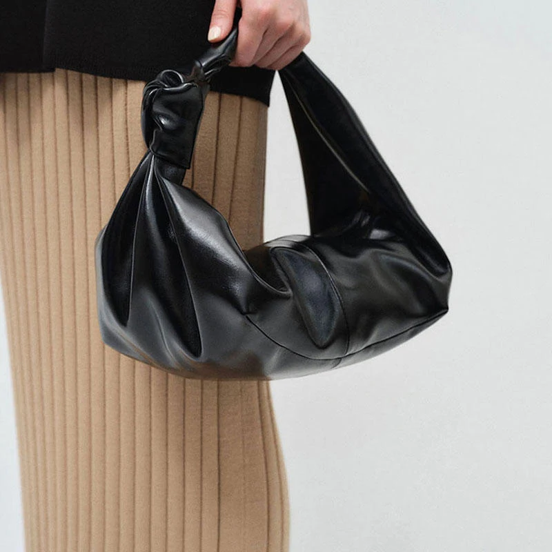 Borsa a mano elegante, semplice e versatile per spalla e ascella. Perfetta per ogni occasione, un accessorio pratico e di stile.