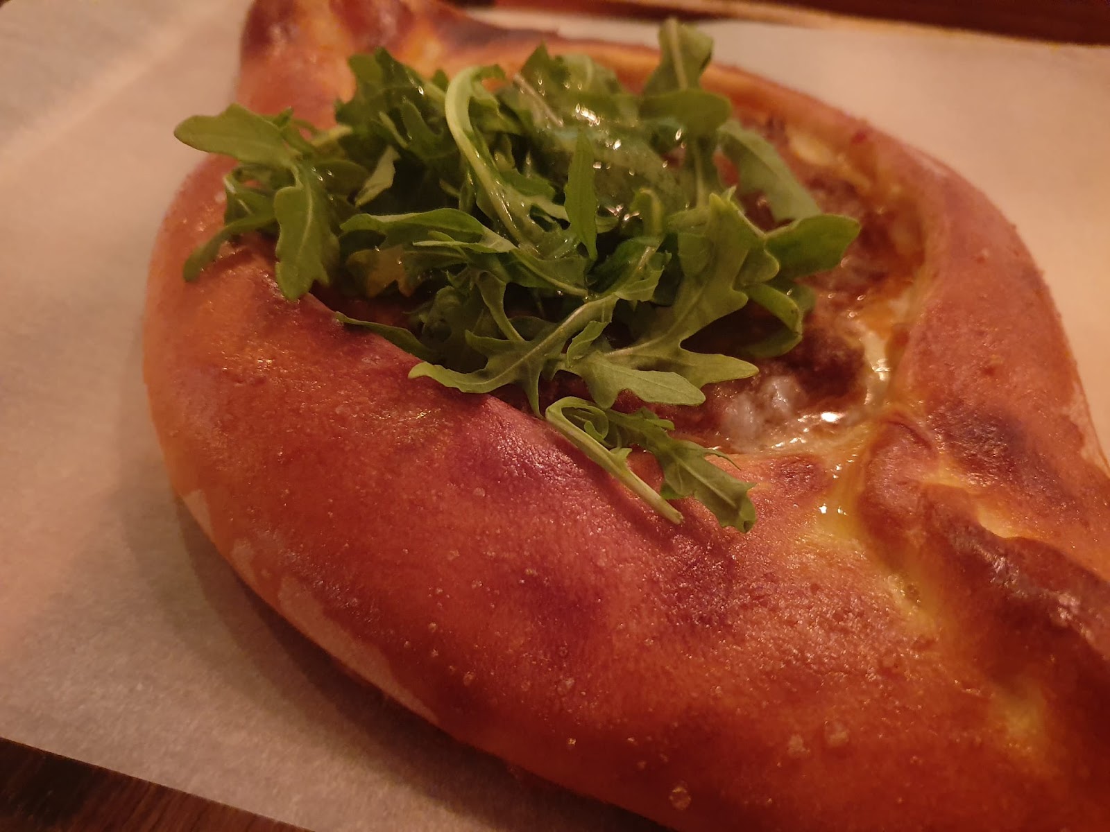 khachapuri with greens and beef patty