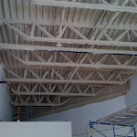 Corrugated metal roof with trusses: foam insulation applied