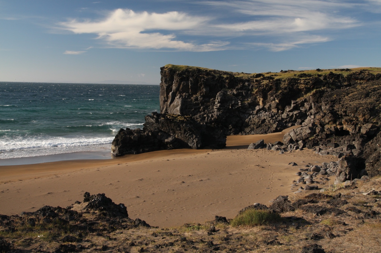 The only beach in Iceland with yellow sand, but the wind is too cold to swim :-)