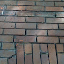 Brick Wall Before Restoration - Tuckpointing