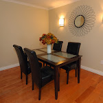 Dining area finished with Hardwood flooring