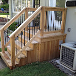 Modern wooden stairs with railings