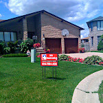 Front house view of gardening and landscaping