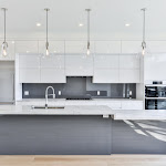 New modern kitchen with TCE stone quartz countertop and white cabinetry