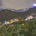 View from a terrace in Santa Teresa during the night. Bright spot is the Cristo Redentor