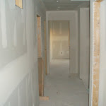 Upper floor-hallway after the drywall installation was added