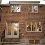 Back of house showing clean exposed brick