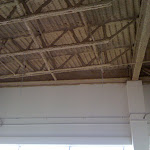 Corrugated metal roof with trusses: foam insulation applied