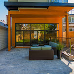 Outside patio area with walkout basement and modern windows