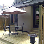 Deck and privacy fence with lattice in backyard