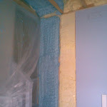 Foam insulation applied in between ceiling joist
and a small part of wall