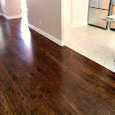 Hardwood merging with tile in the kitchen