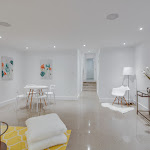 Hallway connecting to the living space with polished concrete flooring