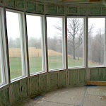 Foam insulation applied in between wall studs;
outside curved wall with windows shown